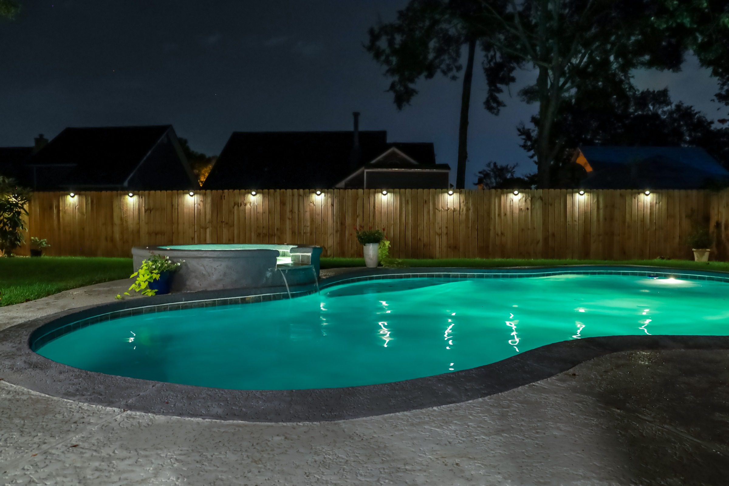 pool at night with warm lights